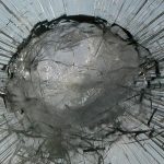 damaged windshield with cracks that needs a windshield replacement